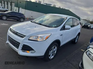 2015 Ford Escape SE with VIN 1FMCU9GX9FUB13662, listed as a IAAI auction lot 42279727 with 73,742 mi miles and . Bid and sale history available at DreamBid. Image 17.