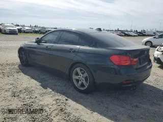 2015 BMW 4 Series 428i with VIN WBA4A9C58FGL86383, listed as a Copart auction lot 47140805 with 159,039 mi miles and Clean title. Bid and sale history available at DreamBid. Image 2.