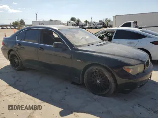 2002 BMW 7 Series 745i with VIN WBAGL634X2DP57617, listed as a Copart auction lot 74073604 with 153,666 mi miles and Clean Title. Bid and sale history available at DreamBid. Image 4.