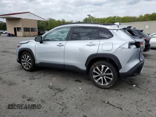 2022 Toyota Corolla Cross XLE with VIN 7MUDAABG2NV009663, listed as a Copart auction lot 55945735 with 59,473 mi miles and Salvage title. Bid and sale history available at DreamBid. Image 2.