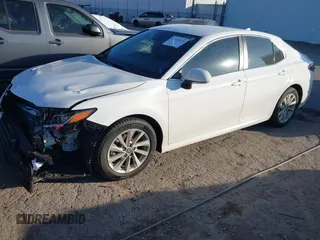 2024 Toyota Camry LE z VIN 4T1R11AK6RU888622, wystawiony jako IAAI lot #41102520 z przebiegiem 12 717 mil mil oraz . Historia ofert i sprzedaży dostępna na DreamBid. Obrazek 17.