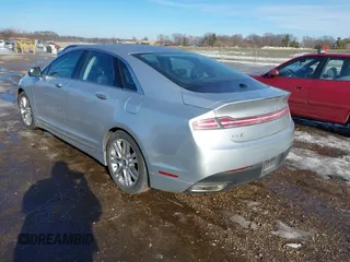 2014 Lincoln MKZ z VIN 3LN6L2G99ER825605, wystawiony jako IAAI lot #41296771 z przebiegiem 195 838 mil mil oraz . Historia ofert i sprzedaży dostępna na DreamBid. Obrazek 3.