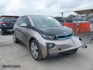 2014 BMW i3 with VIN WBY1Z4C54EVX62782, listed as a IAAI auction lot 41707914 with 94,243 mi miles. Bid and sale history available at carsss.com. Image 1.