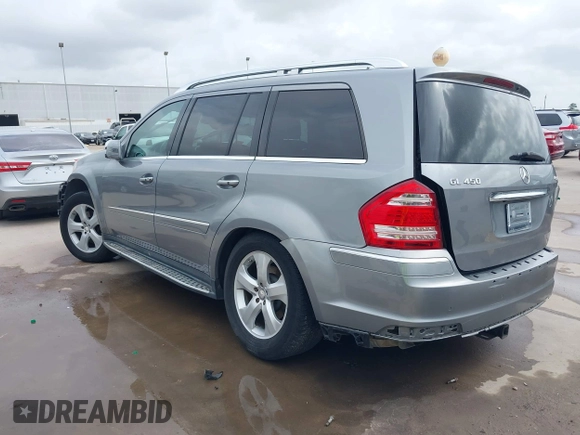 2012 Mercedes-Benz GL-Class GL 450 with VIN 4JGBF7BE9CA794726, listed as a IAAI auction lot 41918937 with 154,393 mi miles. Bid and sale history available at carsss.com. Image 3.