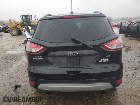 2015 Ford Escape SE with VIN 1FMCU9GX7FUC44640, listed as a Copart auction lot 77141033 with 148,967 mi miles and Salvage Title. Bid and sale history available at DreamBid. Image 6.