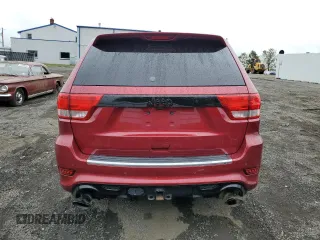 2012 Jeep Grand Cherokee SRT8 with VIN 1C4RJFDJ0CC351195, listed as a Copart auction lot 72794454 with 104,672 mi miles and Salvage Title. Bid and sale history available at carsss.com. Image 6.