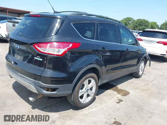2014 Ford Escape SE z VIN 1FMCU0G96EUD57930, wystawiony jako IAAI lot #42347567 z przebiegiem 169 128 mil mil oraz . Historia ofert i sprzedaży dostępna na DreamBid. Obrazek 4.