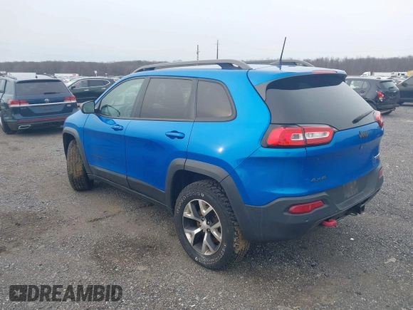2018 Jeep Cherokee Trailhawk with VIN 1C4PJMBX2JD570976, listed as a IAAI auction lot 41610469 with 151,255 mi miles. Bid and sale history available at carsss.com. Image 3.
