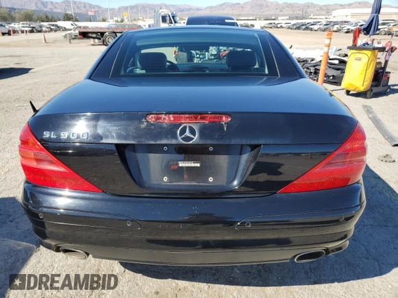 2005 Mercedes-Benz SL 500 with VIN WDBSK75F95F100318, listed as a Copart auction lot 50427245 with 80,320 mi miles and Salvage Title. Bid and sale history available at DreamBid. Image 6.