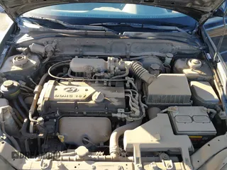 2005 Hyundai Accent GLS with VIN KMHCG45C75U632587, listed as a IAAI auction lot 40946829 with 114,666 mi miles. Bid and sale history available at carsss.com. Image 10.