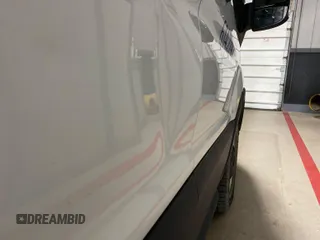 2020 Ford Transit Cargo with VIN 1FTBR1CG6LKA17312, listed as a IAAI auction lot 42284054 with 173,479 mi miles and . Bid and sale history available at DreamBid. Image 21.