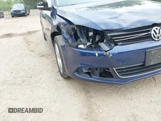 2014 Volkswagen Jetta TDI w/Premium/Nav z VIN 3VWLL7AJ8EM266890, wystawiony jako IAAI lot #42473906 z przebiegiem 146 306 mil mil oraz . Historia ofert i sprzedaży dostępna na DreamBid. Obrazek 6.