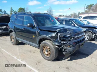 2023 Ford Bronco Sport Badlands z VIN 3FMCR9D95PRD26169, wystawiony jako IAAI lot #41723643 z przebiegiem 21 181 mil mil oraz . Historia ofert i sprzedaży dostępna na DreamBid. Obrazek 1.