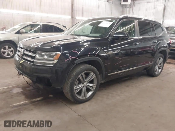 2018 Volkswagen Atlas SEL z VIN 1V2RR2CAXJC548261, wystawiony jako IAAI lot #41650478 z przebiegiem 123 399 mil mil oraz . Historia ofert i sprzedaży dostępna na DreamBid. Obrazek 18.