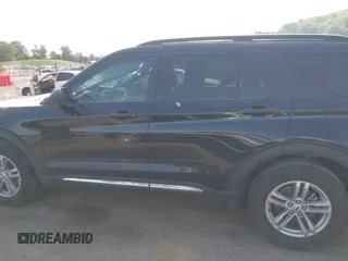 2022 Ford Explorer XLT with VIN 1FMSK8DH9NGB27633, listed as a IAAI auction lot 42117559 with 52,474 mi miles and . Bid and sale history available at DreamBid. Image 14.