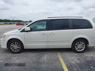 2014 Dodge Grand Caravan SXT z VIN 2C4RDGCGXER322705, wystawiony jako IAAI lot #42450791 z przebiegiem 147 113 mil mil oraz . Historia ofert i sprzedaży dostępna na DreamBid. Obrazek 6.