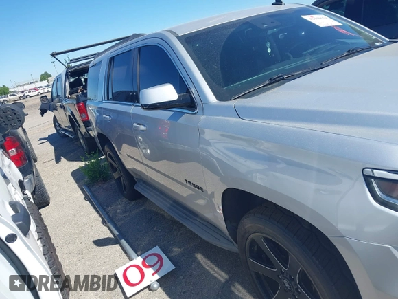 2015 Chevrolet Tahoe LT with VIN 1GNSCBKC9FR111001, listed as a IAAI auction lot 42440624 with 128,087 mi miles and . Bid and sale history available at DreamBid. Image 6.