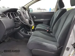 2011 Nissan Versa S with VIN 3N1BC1AP9BL458761, listed as a Copart auction lot 57317115 with 122,606 mi miles and Salvage title. Bid and sale history available at DreamBid. Image 7.