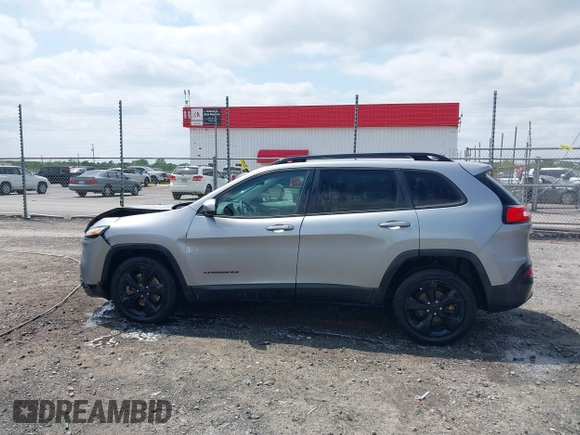 2016 Jeep Cherokee Latitude with VIN 1C4PJLCB3GW176901, listed as a IAAI auction lot 42019983 with 141,104 mi miles and . Bid and sale history available at DreamBid. Image 14.