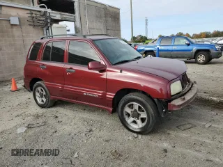 2003 Chevrolet Tracker LT with VIN 2CNBE634136908086, listed as a Copart auction lot 78168894 with 243,614 mi miles and Salvage title. Bid and sale history available at DreamBid. Image 4.