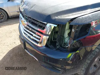 2016 Chevrolet Suburban LT with VIN 1GNSKHKC4GR275389, listed as a IAAI auction lot 41796216 with 144,776 mi miles and . Bid and sale history available at DreamBid. Image 6.