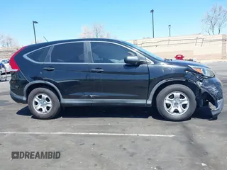2014 Honda CR-V LX with VIN 3CZRM3H36EG704499, listed as a IAAI auction lot 41966876 with 74,054 mi miles. Bid and sale history available at carsss.com. Image 6.
