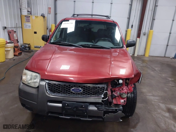 2003 Ford Escape XLT Popular 2 with VIN 1FMCU93173KA52806, listed as a IAAI auction lot 41696250 with 138,338 mi miles. Bid and sale history available at carsss.com. Image 12.