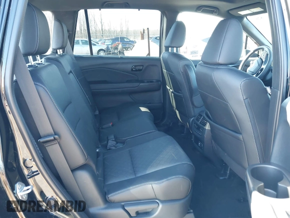 2023 Honda Passport Elite with VIN 5FNYF8H04PB006514, listed as a IAAI auction lot 41537826 with 14,640 mi miles and . Bid and sale history available at DreamBid. Image 8.