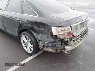 2007 Audi A6 3.2L z VIN WAUDH74F27N098072, wystawiony jako IAAI lot #41675241 z przebiegiem 240 558 mil mil oraz . Historia ofert i sprzedaży dostępna na DreamBid. Obrazek 6.