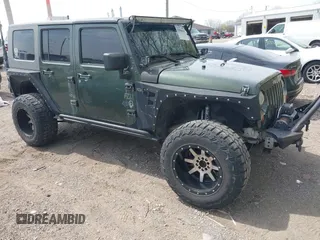 2007 Jeep Wrangler Unlimited X with VIN 1J4GA39147L101084, listed as a IAAI auction lot 41988628 with 194,562 mi miles and . Bid and sale history available at DreamBid. Image 1.