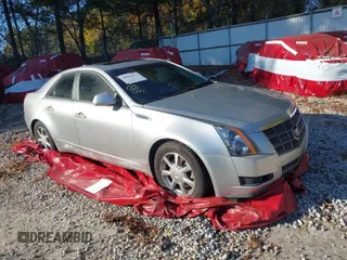 2009 Cadillac CTS AWD w/1SA with VIN 1G6DG577990113457, listed as a IAAI auction lot 38002705 with 101,298 mi miles. Bid and sale history available at carsss.com. Image 1.
