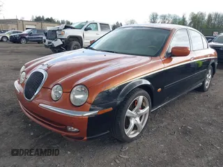 2001 Jaguar S-Type V6 z VIN SAJDA01C51FL84719, wystawiony jako IAAI lot #42192335 z przebiegiem 160 095 mil mil oraz . Historia ofert i sprzedaży dostępna na DreamBid. Obrazek 2.