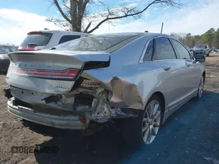 2015 Lincoln MKZ with VIN 3LN6L2G9XFR607285, listed as a IAAI auction lot 41572389 with 138,899 mi miles and . Bid and sale history available at DreamBid. Image 6.