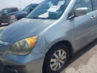 2010 Honda Odyssey EX with VIN 5FNRL3H42AB002679, listed as a IAAI auction lot 42692701 with 179,905 mi miles and . Bid and sale history available at DreamBid. Image 6.