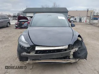 2023 Tesla Model Y Performance with VIN 7SAYGDEF2PF757113, listed as a IAAI auction lot 41881175 with 54,809 mi miles and . Bid and sale history available at DreamBid. Image 13.