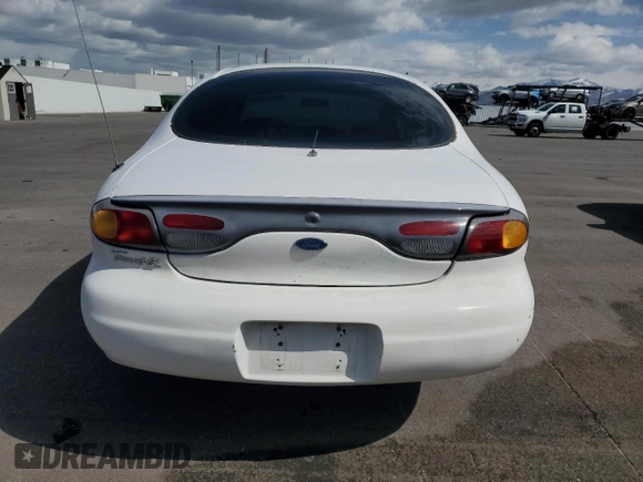 1997 Ford Taurus z VIN 1FALP5217VG249170, wystawiony jako Copart lot #51317795 z przebiegiem 87 730 mil mil oraz Czysty tytuł • Clean title. Historia ofert i sprzedaży dostępna na DreamBid. Obrazek 6.
