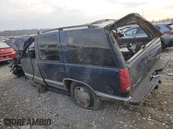 1996 GMC Yukon with VIN 1GKEK13R2TJ718801, listed as a Copart auction lot 84489744 with Not Provided miles and Salvage Title. Bid and sale history available at DreamBid. Image 2.