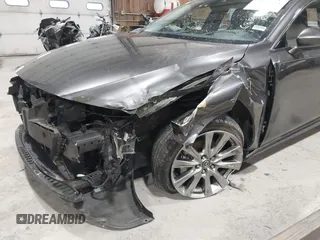 2020 Mazda 3 Premium with VIN 3MZBPBEM3LM123091, listed as a IAAI auction lot 41568213 with 68,515 mi miles and . Bid and sale history available at DreamBid. Image 6.