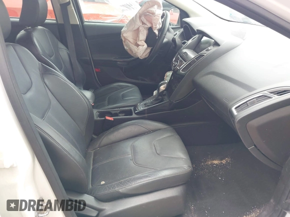 2016 Ford Focus Titanium with VIN 1FADP3N27GL319497, listed as a IAAI auction lot 42385359 with Not provided miles and . Bid and sale history available at DreamBid. Image 5.