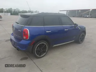 2015 MINI Cooper Countryman S with VIN WMWZC5C50FWP47426, listed as a IAAI auction lot 42108546 with 103,281 mi miles. Bid and sale history available at carsss.com. Image 4.