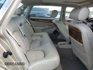 1999 Jaguar XJ z VIN SAJKX6048XC849376, wystawiony jako Copart lot #70538064 z przebiegiem 122 891 mil mil oraz Szkoda całkowita • Salvage title. Historia ofert i sprzedaży dostępna na DreamBid. Obrazek 10.