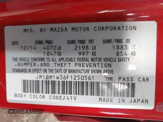 2015 Mazda 3 S Grand Touring z VIN JM1BM1W36F1250561, wystawiony jako IAAI lot #41628951 z przebiegiem 175 622 mil mil oraz . Historia ofert i sprzedaży dostępna na DreamBid. Obrazek 9.