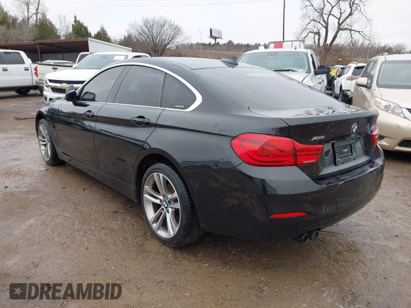2019 BMW 4 Series 430i xDrive with VIN WBA4J3C53KBL08291, listed as a IAAI auction lot 41471858 with 63,933 mi miles. Bid and sale history available at carsss.com. Image 3.