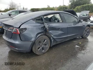 2023 Tesla Model 3 with VIN 5YJ3E1EA2PF639868, listed as a Copart auction lot 49247765 with 19,215 mi miles and Salvage Title. Bid and sale history available at carsss.com. Image 3.