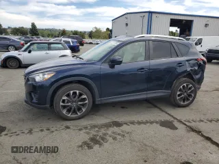 2016 Mazda CX-5 Grand Touring with VIN JM3KE4DY4G0750939, listed as a Copart auction lot 52727395 with 72,428 mi miles and Salvage Title. Bid and sale history available at carsss.com. Image 1.