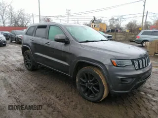 2020 Jeep Grand Cherokee Altitude with VIN 1C4RJFAGXLC211518, listed as a IAAI auction lot 41668994 with 130,371 mi miles. Bid and sale history available at carsss.com. Image 1.