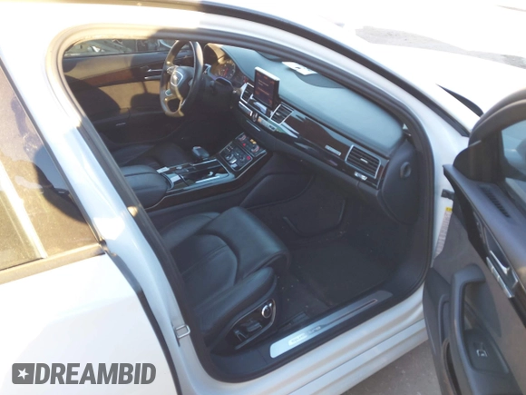 2018 Audi A8 L with VIN WAU44AFD7JN000598, listed as a IAAI auction lot 41313616 with 112,811 mi miles. Bid and sale history available at carsss.com. Image 5.