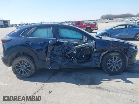 2023 Mazda CX-30 S with VIN 3MVDMBAM6PM579780, listed as a IAAI auction lot 41780720 with 32,603 mi miles and . Bid and sale history available at DreamBid. Image 13.