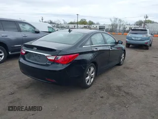 2013 Hyundai Sonata SE with VIN 5NPEC4ACXDH696923, listed as a IAAI auction lot 42088099 with 205,068 mi miles and . Bid and sale history available at carsss.com. Image 4.