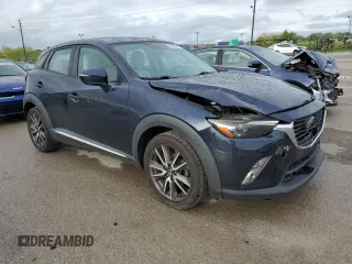 2017 Mazda CX-3 Grand Touring z VIN JM1DKFD75H0141048, wystawiony jako Copart lot #55752185 z przebiegiem 89 960 mil mil oraz Szkody całkowita. Historia ofert i sprzedaży dostępna na DreamBid. Obrazek 4.